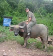 24_3966028-24-Riding-a-buffalo-Ban-Lao-Khao-near-Muang-Sing-0.jpg