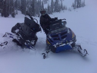 Gage trying to hold his sled on one ski!.jpg