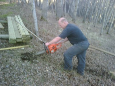 cutting ground with chainsaw 2.jpg